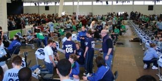 A crowded hall at a national indoor rowing competition